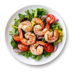 Salad with shrimps in a white plate