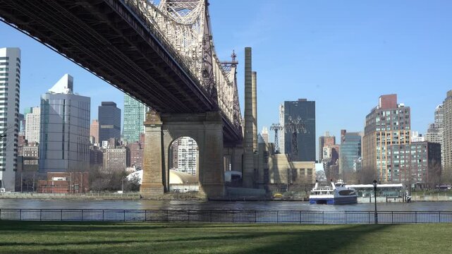 Beneath Queensboro bridge at Queensbridge Park, ferry docking