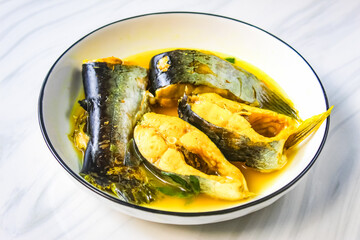a plate of fish soup