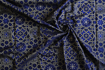 luxury brocade fabric with gold and blue pattern