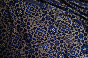luxury brocade fabric with gold and blue pattern