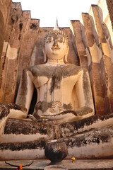 The Phra Achana, a big sitting buddha statue inside the Wat Si Chum Temple, Historical Park,...