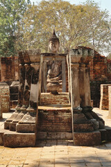 Small sitting buddha statue at the Wat Si Chum Temple, Historical Park, archaeological site,...
