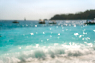 Fototapeta premium Blurred Beach with Bokeh Effect from Sunlight Reflections