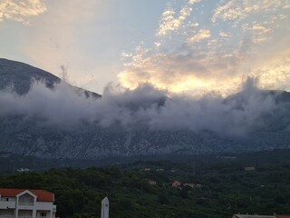 scenery of mountains in the fog. mountains in the morning. landscape with clouds.  scenic clouds...