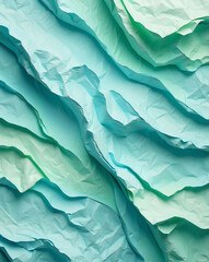 Fototapeta premium Crinkled paper texture with pale blue to mint green gradient