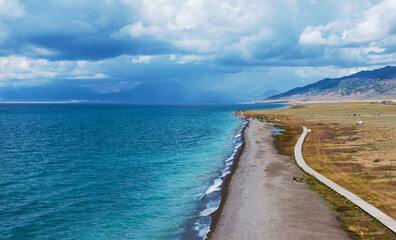 Aerial photography of the famous Sayram Lake and grassland pastures in Xinjiang, China