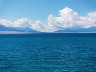 Aerial photography of the famous Sayram Lake and mountain ranges in Xinjiang, China