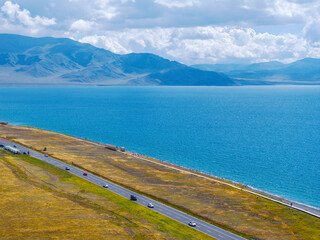 Aerial photography of the famous Sayram Lake and grassland pastures in Xinjiang, China