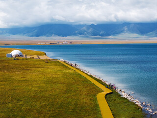 Obraz premium Aerial photography of the famous Sayram Lake and grassland pastures in Xinjiang, China