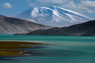 Mountains and lakes in the Xinjiang Plateau of China, and grassland and pasture scenery in autumn