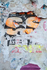 Fototapeta premium Torn and ripped street poster background, weathered paper backdrop
