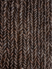 Round stones in the ground. Texture of the cobblestones. Paved road. The paving stones. Abstract background