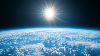 Clouds on planet Earth from space, rising shining sun, satellite view of stratosphere cloudscape
