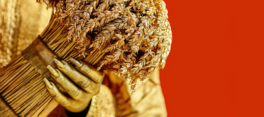 A golden harvest celebration showcasing a beautiful bouquet of wheat against a vibrant red backdrop during the autumn festival