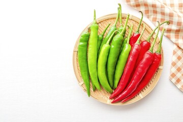 spur chilli, spur chili pepper, spur pepper, long red pepper on white background