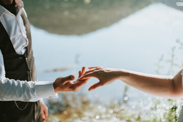 bride and groom holding hands