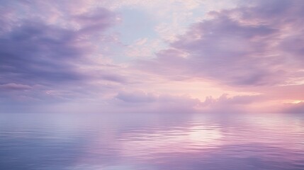 Serene Sunset Over Calm Waters with Soft Cloud Reflections
