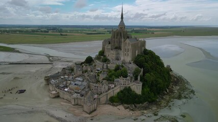 The drone aerial footage of Saint Michael's mount, France. Saint Michael's Mount is a tidal island and mainland commune in Normandy, France.
