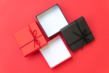 The top view of the black and red gift box with the lid open. Christmas and New Year Celebration Gifts