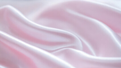 Obraz premium Soft pink silk fabric with smooth, flowing texture