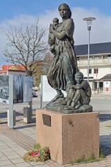 Krigsmodrem monumentet (Wartime Mothers Monument) is situated in open square in the center of town, Kirkenes, Norway.