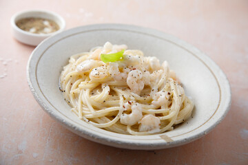 Pasta with cream sauce and shrimps