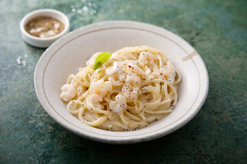 Pasta with cream sauce and shrimps