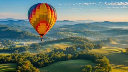 Fototapeta premium Hot Air Balloon Soaring Over Rolling Green Hills