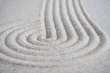 lines and circle formation on beach sand with customizable space for text