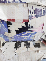 Fototapeta premium Vertical torn and ripped street poster background, messy and retro weathered paper collage