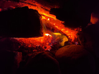 The closer details of a night fire and hot coals
