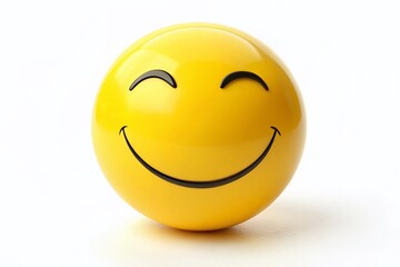 Fototapeta premium A bright yellow smiling face with closed eyes and a curved upward mouth, conveying happiness and friendliness, on