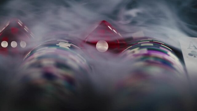 Gambling Game Money Chips and Red Dices and Poker Cards in Smoke Ambiance