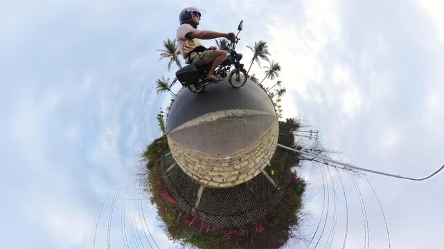 Motorbike Riding (Tiny Planet Effect). Man Using Insta360 Camera With Invisible Selfie Stick To Document His Solo Travel Journey.