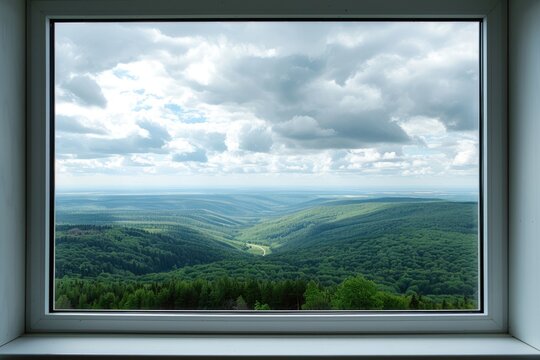 Fototapeta View through an open window onto beautiful landscape