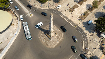 Aerial view the Terra d'Otranto Obelisk and the adjacent roundabout. It is one of the monument of Lecce, Puglia, Italy. © Stefano Tammaro
