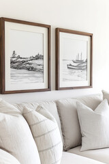  Two framed drawings on the wall, simple line art, white background, modern and elegant style, wooden frames, coastal theme with boats and lighthouses, light grey color of paper, and dark wood frames.