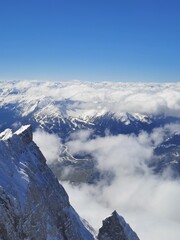 Naklejka premium Snow covered mountain top in Austria. View of the Alps from the Zugspitze, the highest mountain in Germany