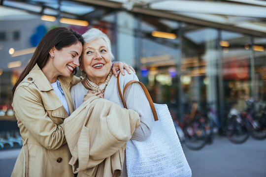 Happy Senior Woman and Daughter Enjoying Time Together Outdoors