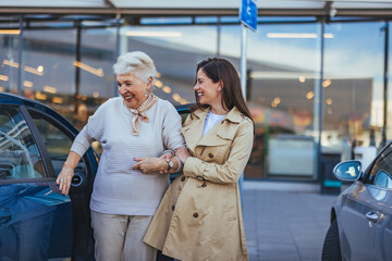Elderly Woman and Daughter Enjoy Time Together Outdoors