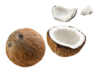 Coconut, half and pieces flying on white background. Isolated