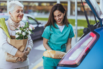 Caregiver Assisting Elderly Woman with Grocery Shopping