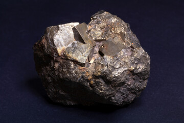Pyrite mineral with gleaming surface and detailed, reflective crystal formations