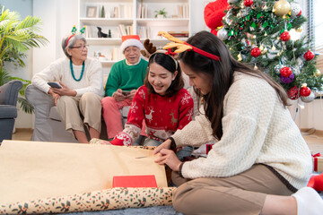 The family's gift-giving activity during Christmas at home