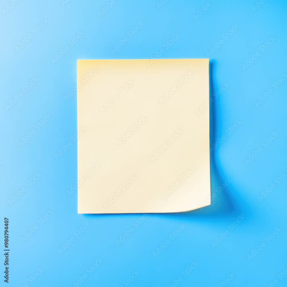 Poster a blank yellow sticky note on blue background, perfect for jotting down reminders or messages. its s