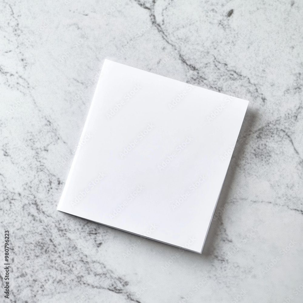 Poster a blank adhesive note tape on marble surface, perfect for messages and reminders. its clean design a