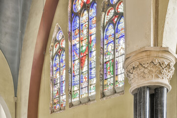 Colorful stained glass windows in a historical church