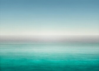 Obraz premium Softly blended sea green, grey, and blue hues create a calming ombre background with subtle gradient texture, providing ample copy space for creative designs.