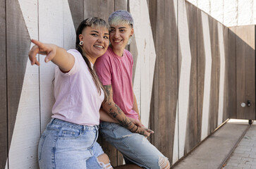 Lesbian couple enjoying a playful moment together